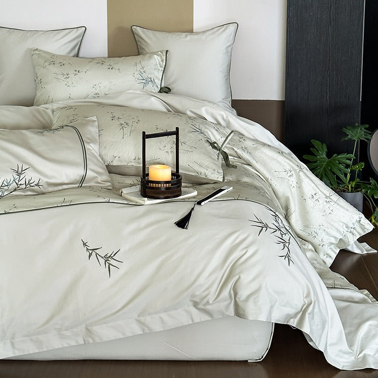 Reversible cotton satin bedding set with fine bamboo print and pillowcases with tie bands