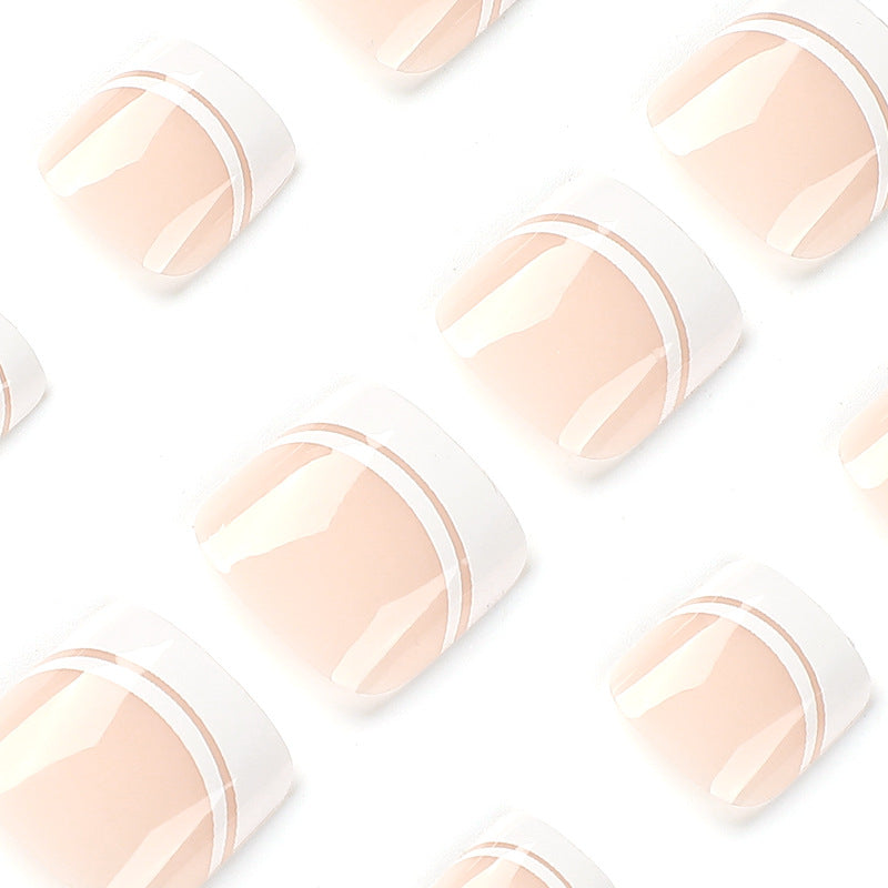 Artful toenail art with elegant French tip design Kalsten