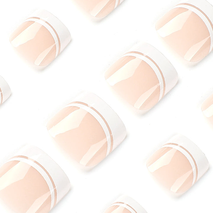 Artful toenail art with elegant French tip design Kalsten