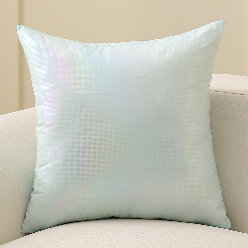 Square decorative cushion with delicate mother-of-pearl look and fine micro tuft structure
