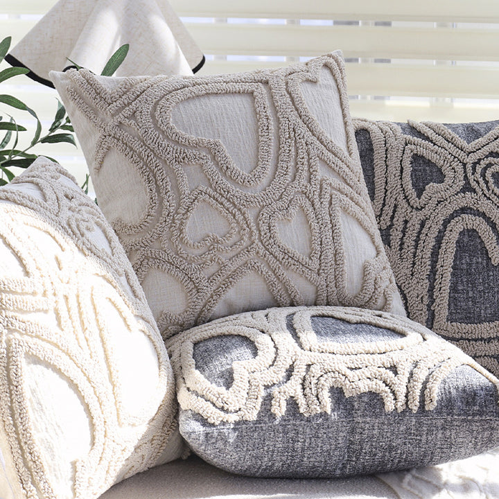 Square cushion cover with three-dimensional looped heart relief made of soft bouclé mix Kalsten