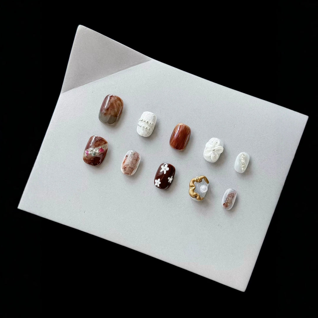 Artistic Press-On Nail Set with Unique Textures and Designs