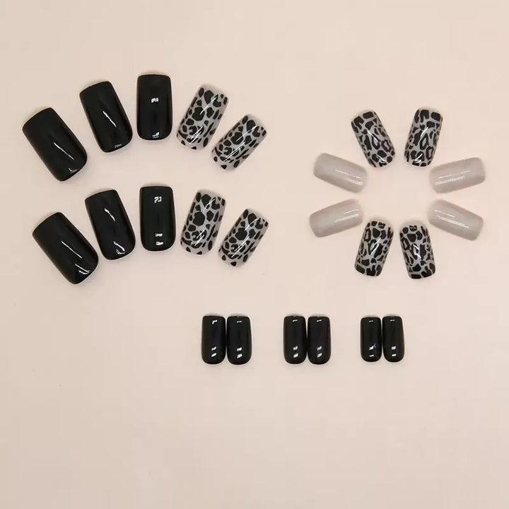 Acrylic nail set with stylish leopard pattern and elegant accents Kalsten