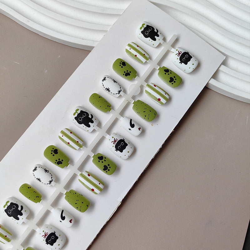 Creative art press-on nails with playful animal design Kalsten