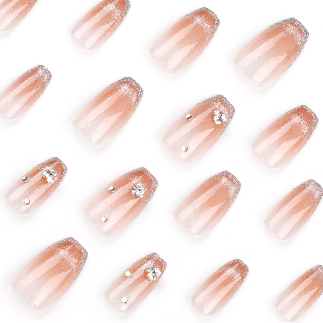 Glamorous artificial nails with glitter and rhinestone accents Kalsten