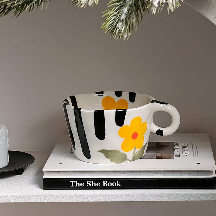Ceramic mug with hand-painted penguin pattern