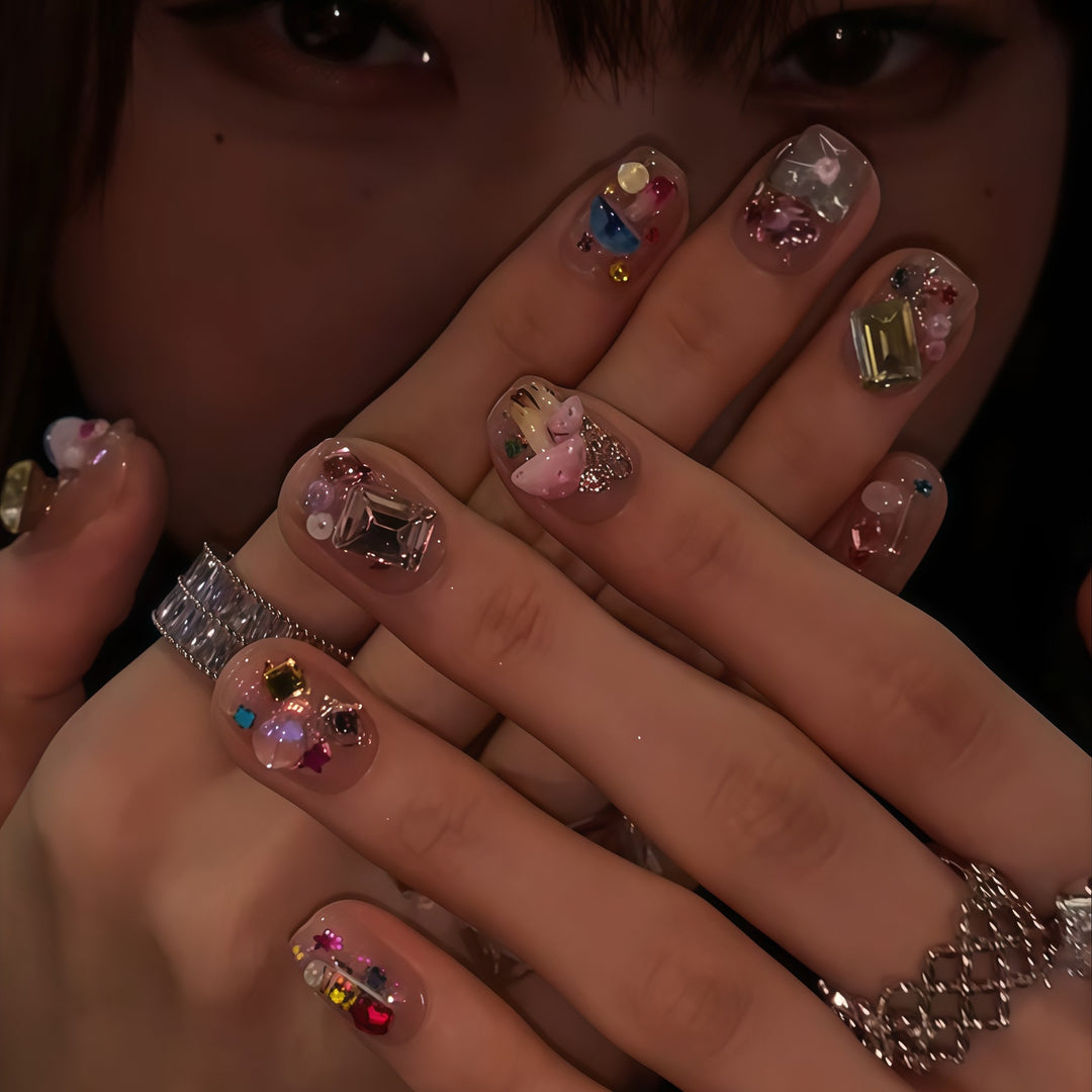 Artificial nails with sparkling crystal accents Kalsten