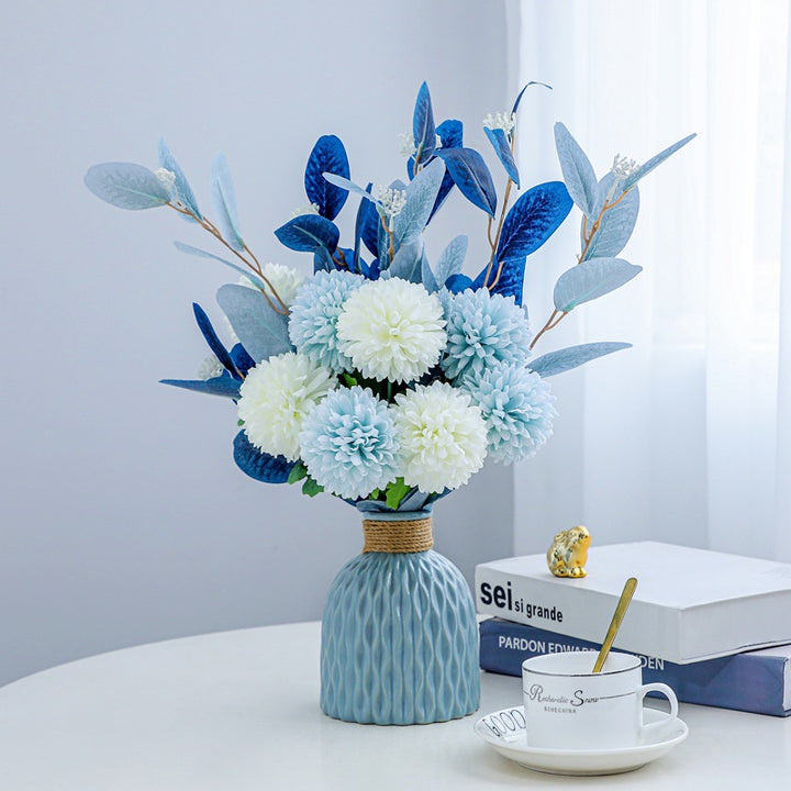 Lifelike Floral Arrangement in Decorative Vase
