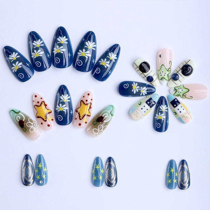 Artificial nails with creative maritime designs and 3D elements Kalsten
