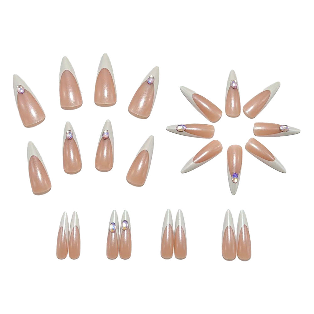 Artificial nails in modern stiletto design with glitter accents Kalsten