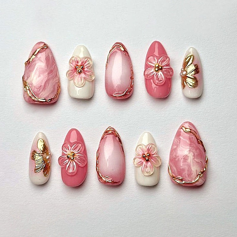 Artificial nail art with floral and glamorous designs Kalsten