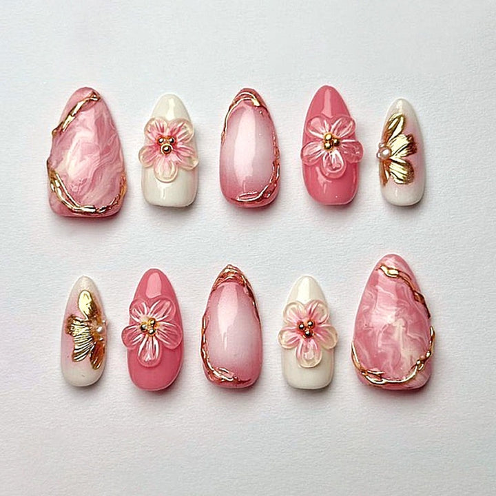 Artificial nail art with floral and glamorous designs Kalsten