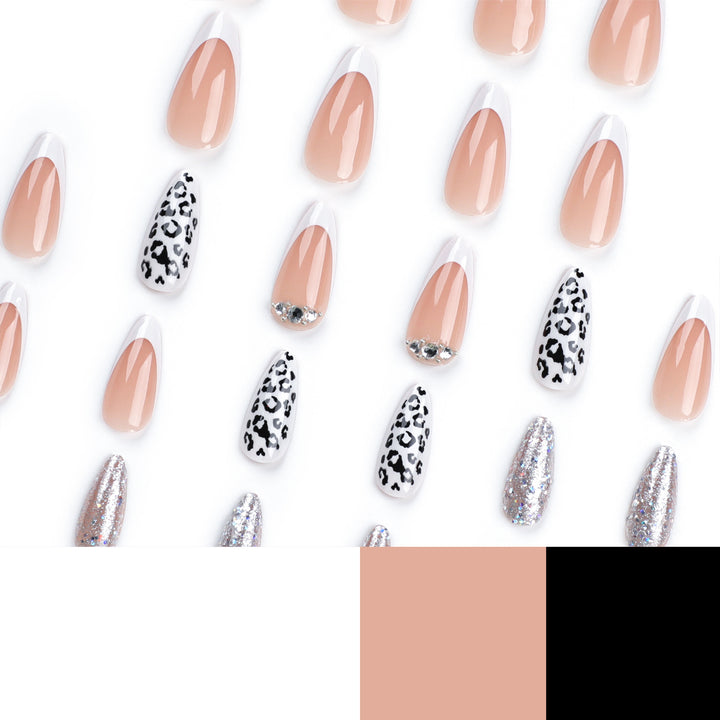 Artful stiletto nails with leopard patterns and glitter accents Kalsten