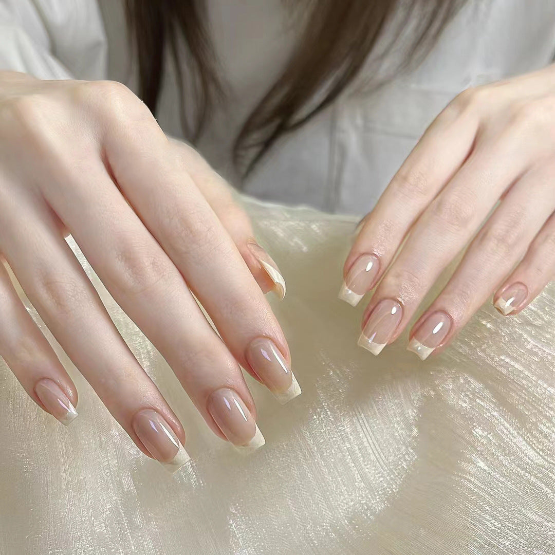 Glamorous artificial nails with delicate flower and glitter effects Kalsten