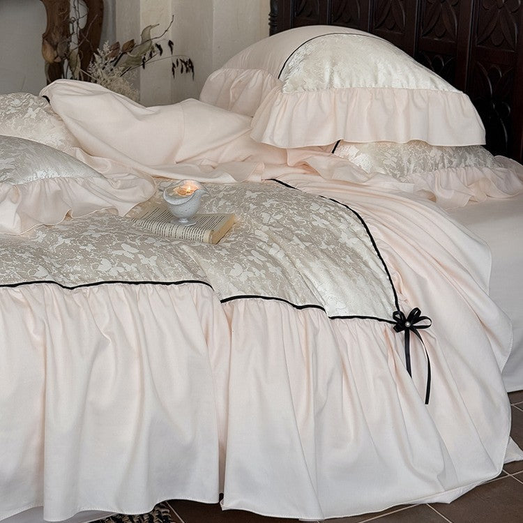 Romantic bed set with frill, jacquard relief and decorative ribbon