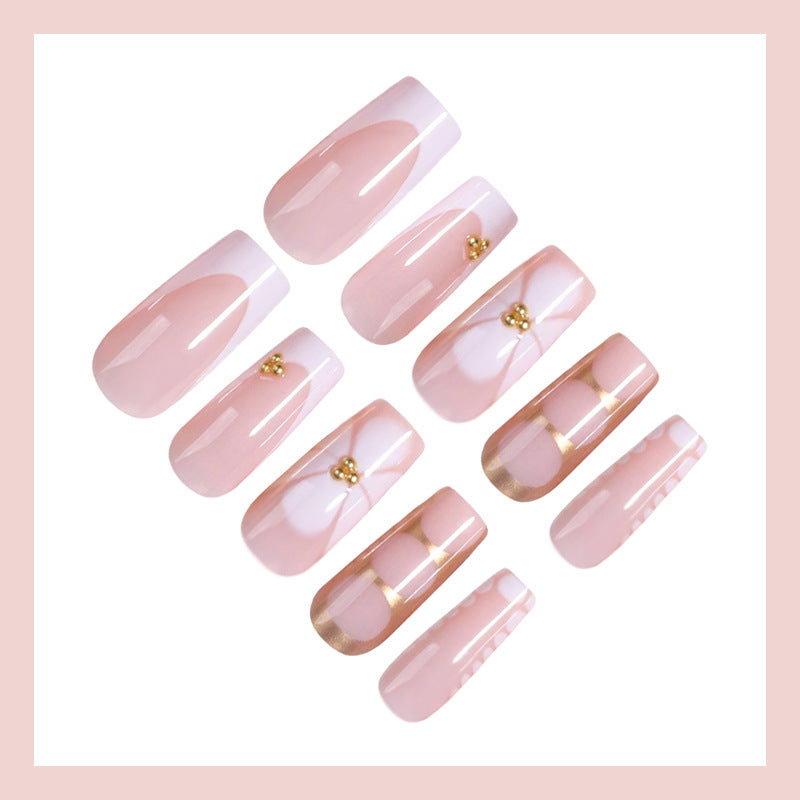 Artificial nail set with elegant gold embellishments and romantic accents Kalsten