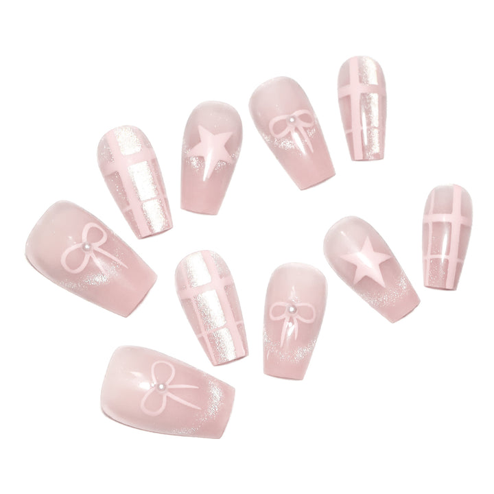 Artistic acrylic nails with elegant bow and star designs Kalsten