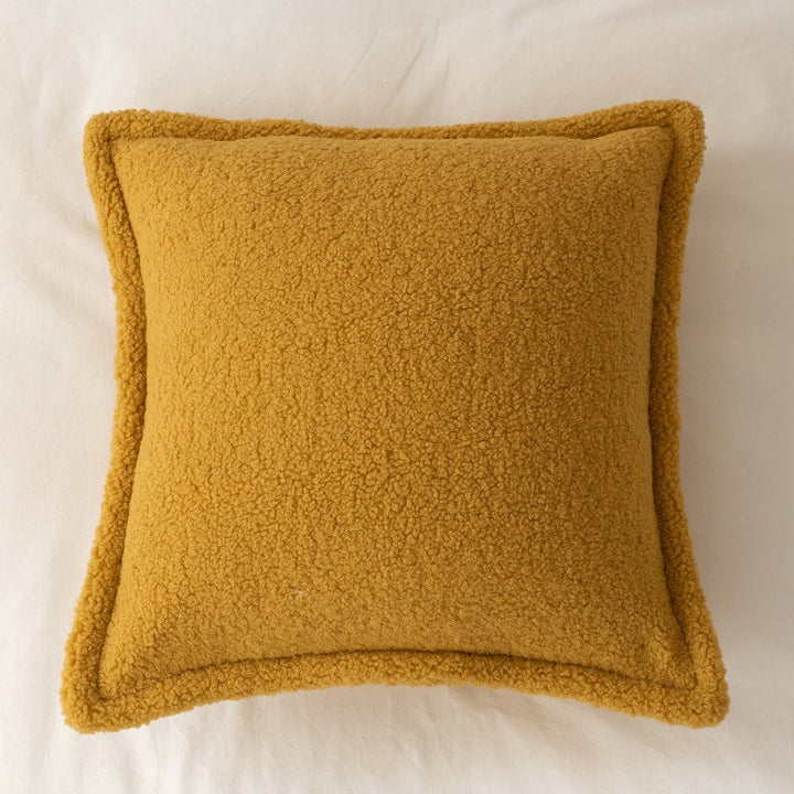 Decorative teddy fleece cushion with padded filling and piped seam