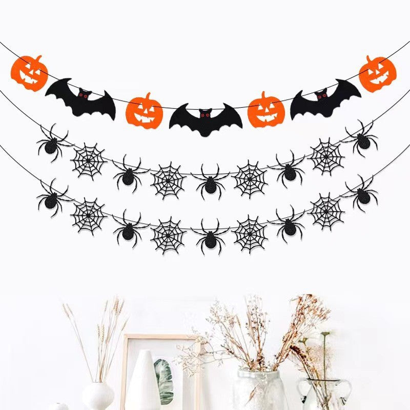 Hanging Halloween garland made of felt with spider and spider web appliqués