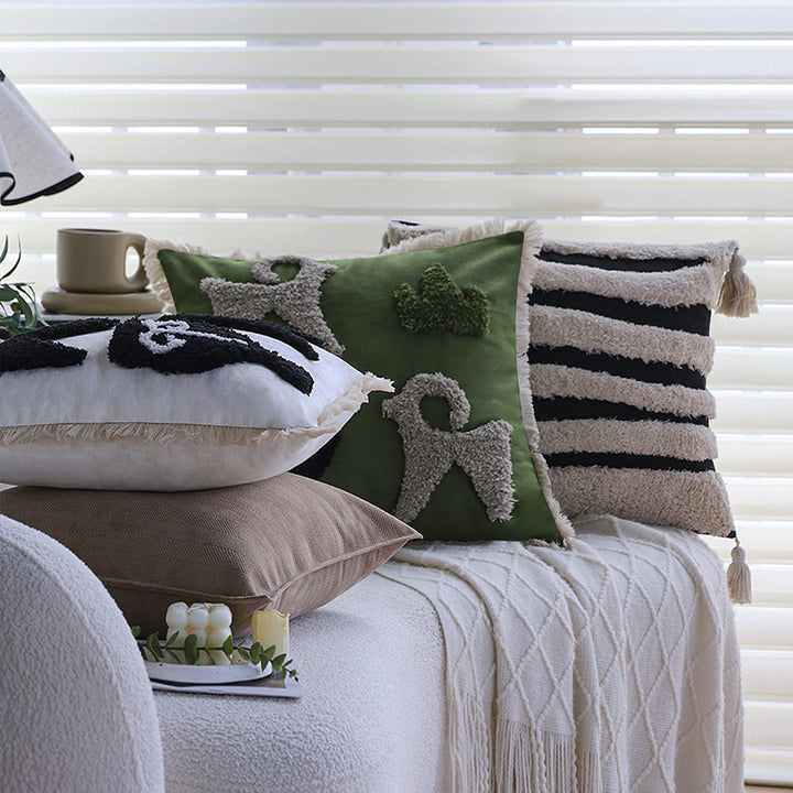 Square decorative cushion cover with hand-tufted ethnic appliqué motif and fringed edge Kalsten