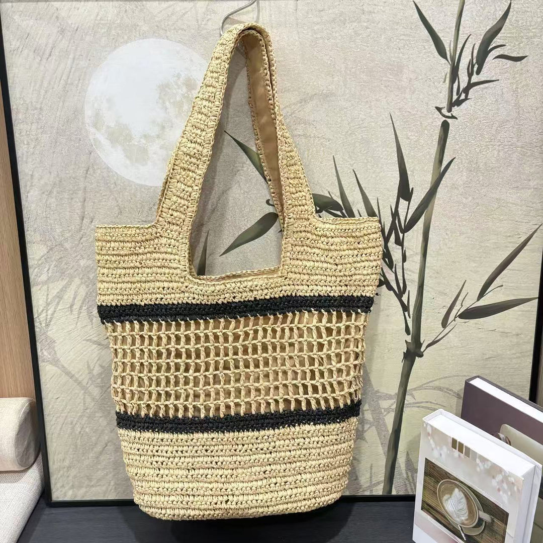 Woven natural material handbag with elegant structure Kalsten