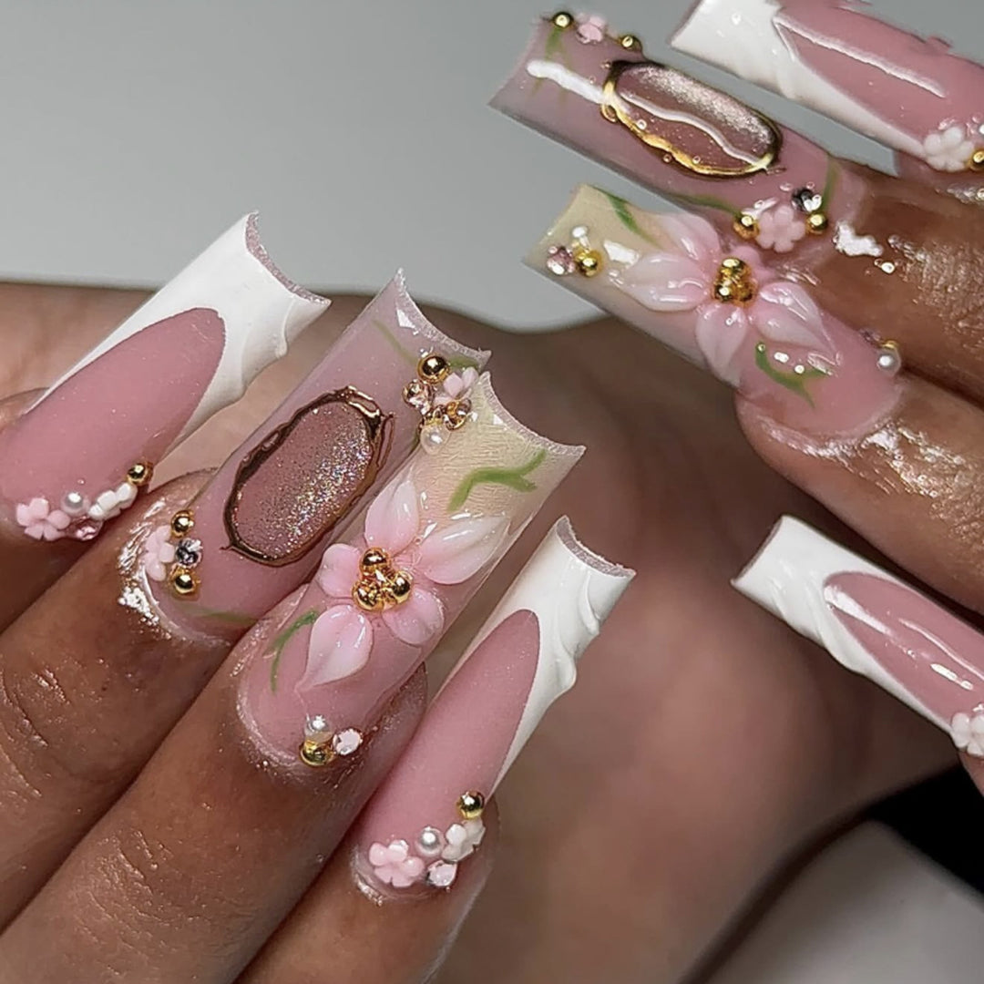 Artful nail extensions with floral embellishments Kalsten