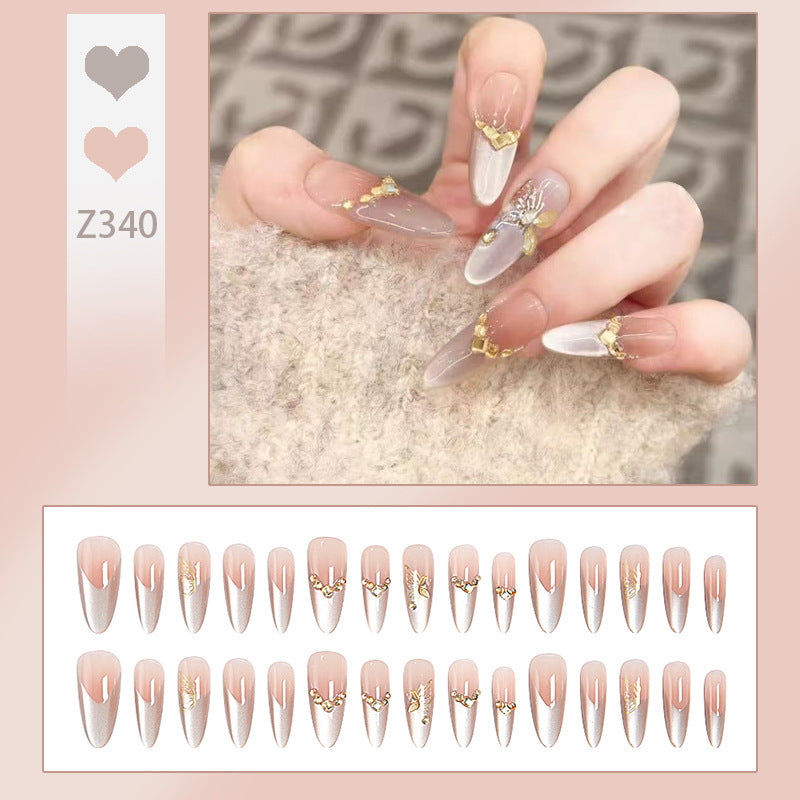 Glamorous art nails with elegant golden details Kalsten