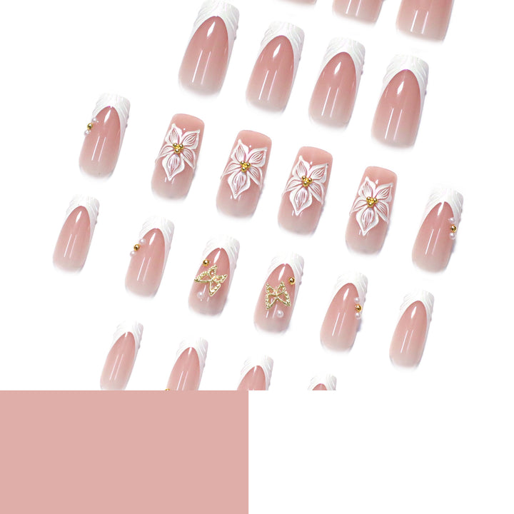 Elegant artificial nails with floral design and gold accents Kalsten