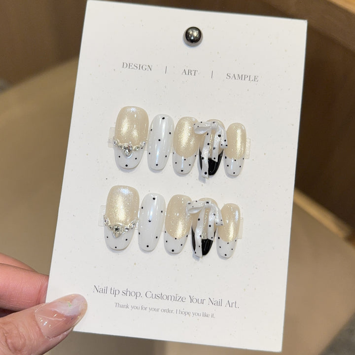 Artificial nails with glitter and bows Kalsten