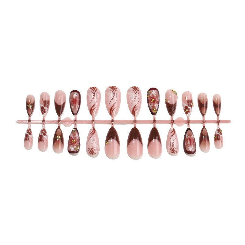 Acrylic nail set with elegant 3D flower accents and glamorous designs Kalsten