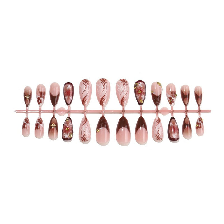 Acrylic nail set with elegant 3D flower accents and glamorous designs Kalsten