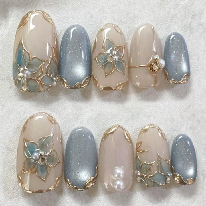 Glamorous artificial nails with floral designs Kalsten