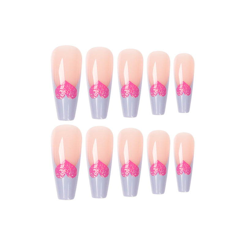 Artful stiletto nails with colorful heart designs Kalsten