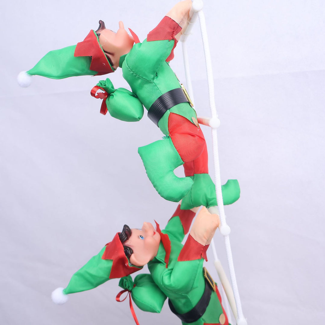 Inflatable Santa Claus figures climbing ladder