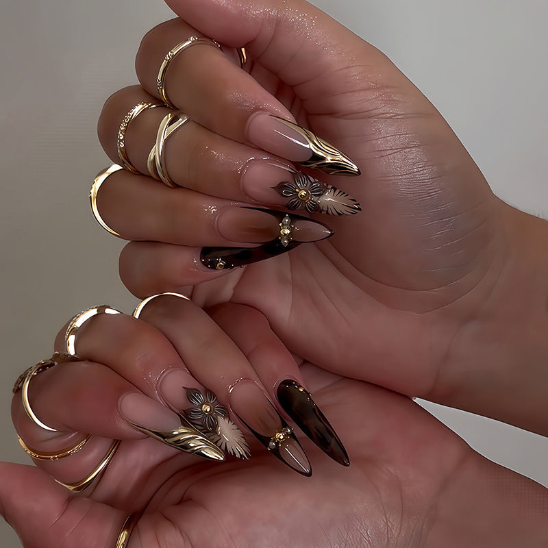 Acrylic nail set with elegant floral design and spectacular glitter accents Kalsten