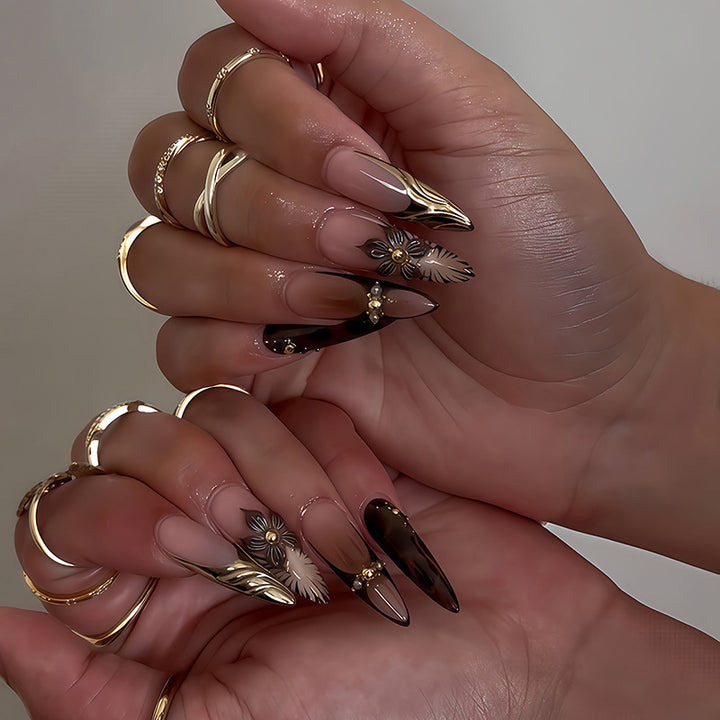 Acrylic nail set with elegant floral design and spectacular glitter accents Kalsten