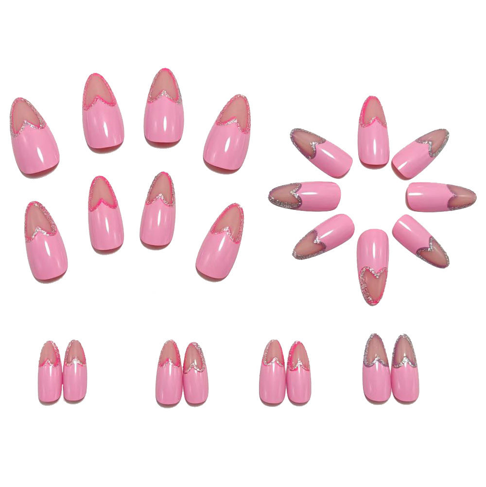 Art nails with heart design and glitter accents Kalsten