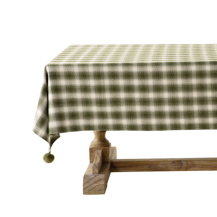 Square tablecloth made of cotton blend fabric with checkered weave pattern and pom-pom corners Kalsten