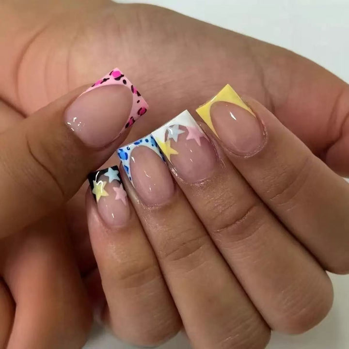 Acrylic nail set with colorful star motifs and modern accents Kalsten