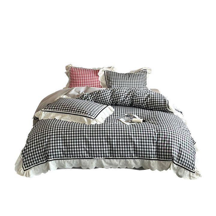 Quilted bedding set made of cotton blend with check pattern and decorative lace ruffle