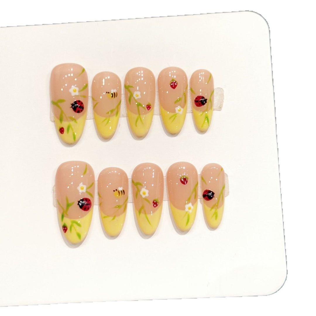 Artistic Press-On Nail Set with Floral and Insect Designs