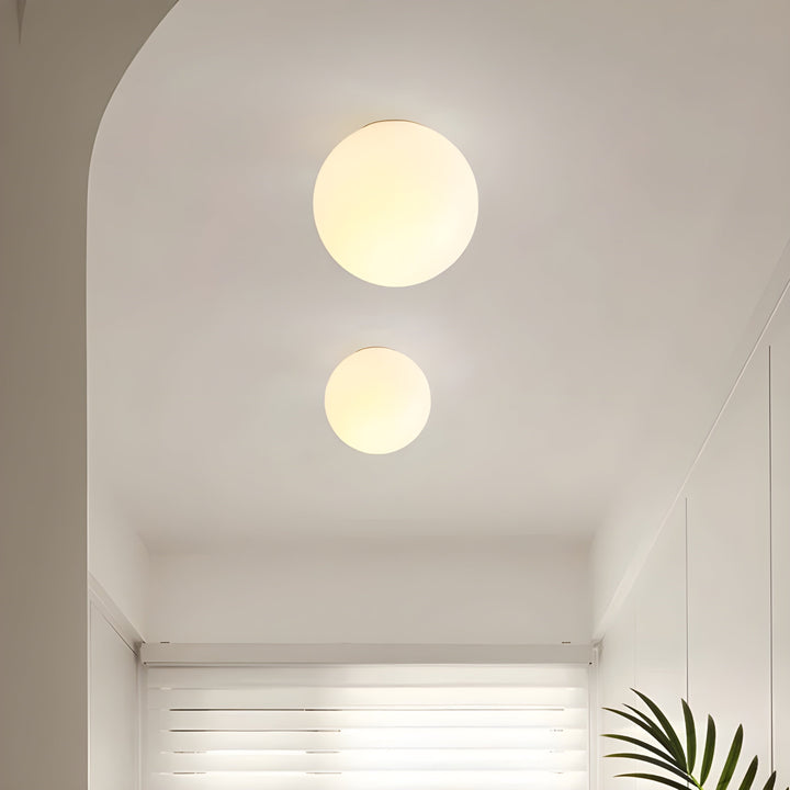 GlasAura Wall Lamp with Matte Glass Ball and Metal Base | Kalsten