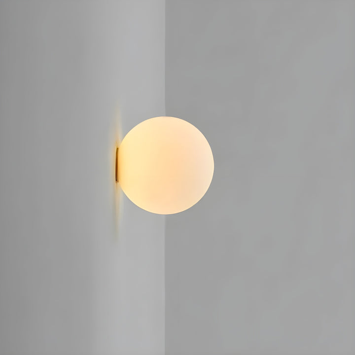 GlasAura Wall Lamp with Matte Glass Ball and Metal Base | Kalsten