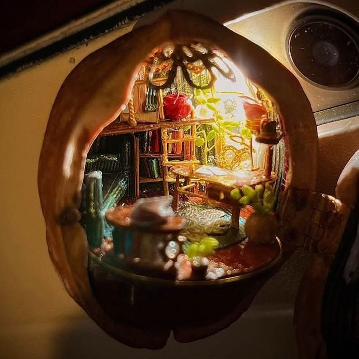 Kalsten | Handcrafted dollhouse made from walnut shells with interior light