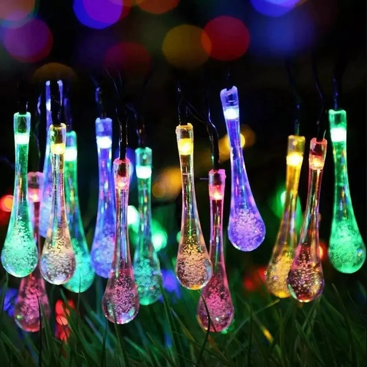 Solar-powered dew drop string lights for garden, waterproof LED decorative lighting for outdoor areas | Noxord