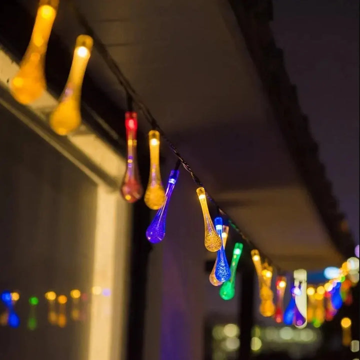 Solar-powered dew drop string lights for garden, waterproof LED decorative lighting for outdoor areas | Noxord