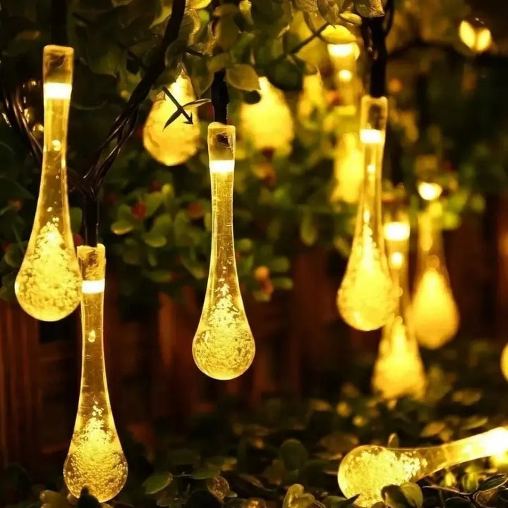 Solar-powered dew drop string lights for garden, waterproof LED decorative lighting for outdoor areas | Noxord