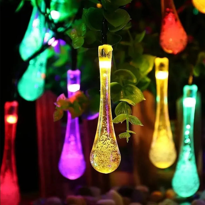 Solar-powered dew drop string lights for garden, waterproof LED decorative lighting for outdoor areas | Noxord