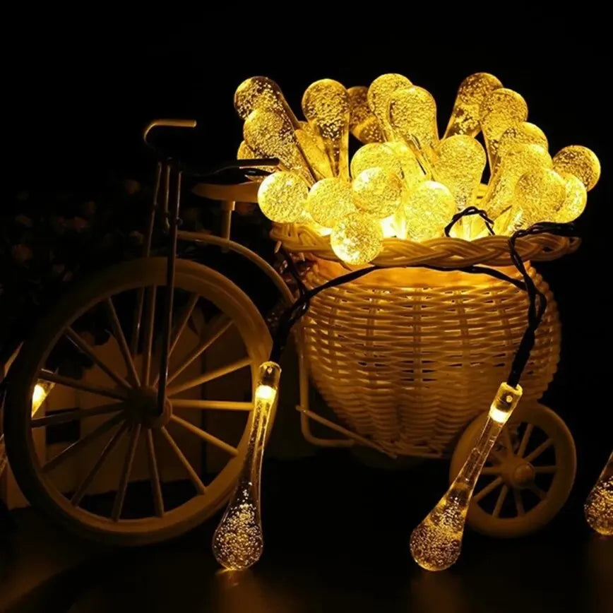 Solar-powered dew drop string lights for garden, waterproof LED decorative lighting for outdoor areas | Noxord