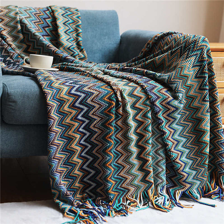 Colorful striped throw blanket with tassels